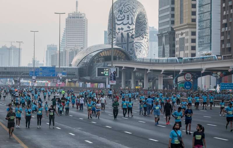 One of the UAE's biggest thoroughfares was closed to traffic last year as tens of thousands of runners took part in the Dubai Run 2021. All photos: Ruel Pableo / The National unless otherwise specified