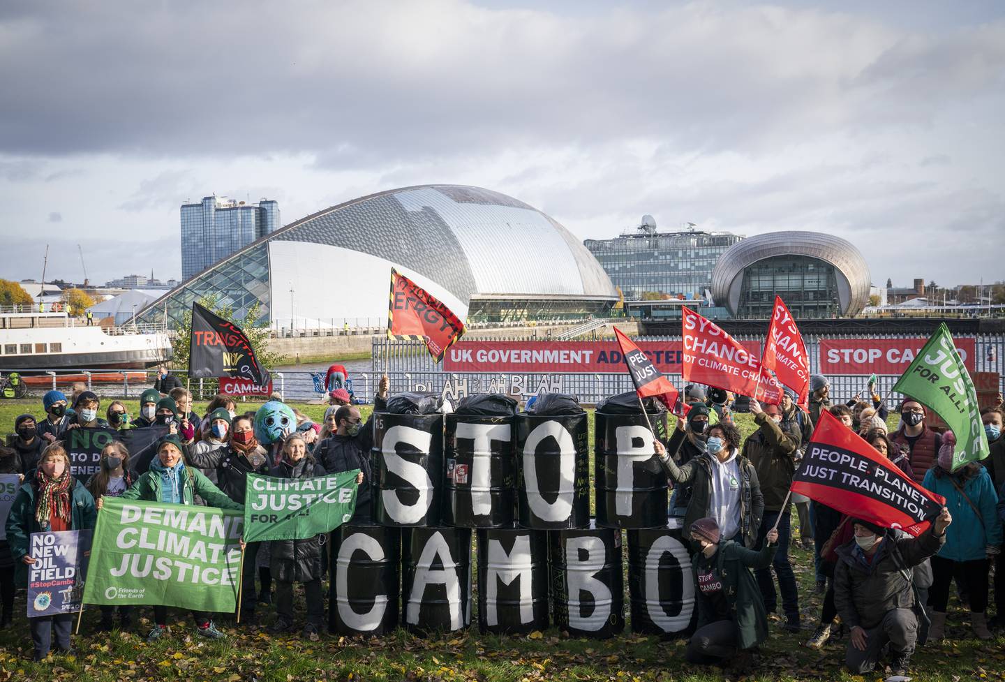 Activists from Friends of the Earth at a demonstration, during the Cop26 summit in Glasgow, calling for an end to all new oil and gas projects in the North Sea, starting with the proposed Cambo oil field. PA