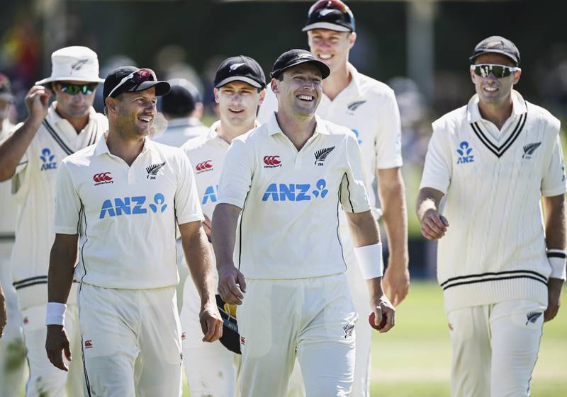 Matt Henry of New Zealand is all smiles after taking 7 wickets during play on day one of the first cricket test between South Africa and New Zealand at Hagely Oval in Christchurch, New Zealand, Thursday, Feb.  17, 2022.  (Andrew Cornaga / Photosport via AP)