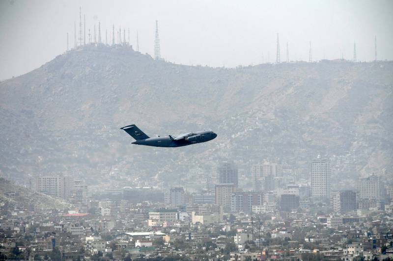 One of the last US Air Force transport planes leaves Kabul. With the official evacuation programme coming to a close, former British and American military veterans are helping their former employees to escape the Taliban regime, 'The National' has learnt. AFP