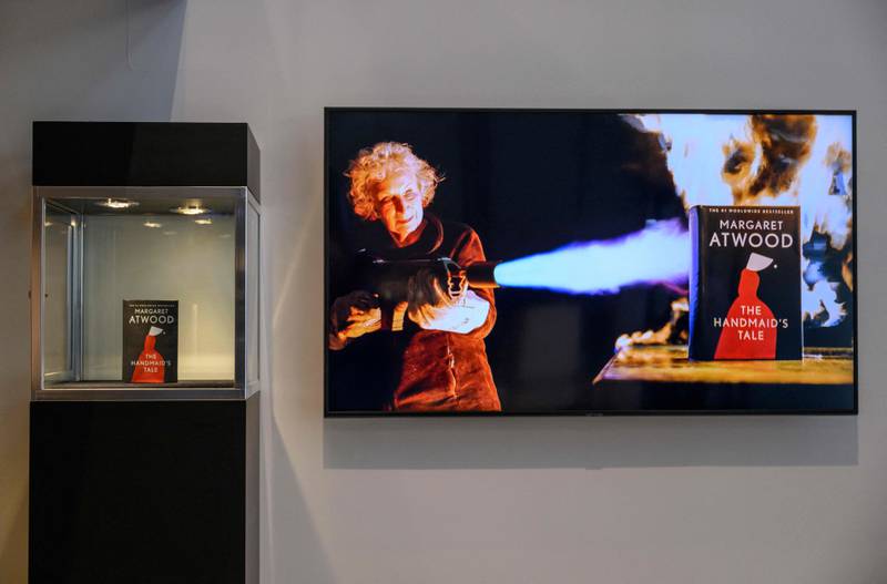 A parody of book-burning at the Margaret Atwood auction. AFP