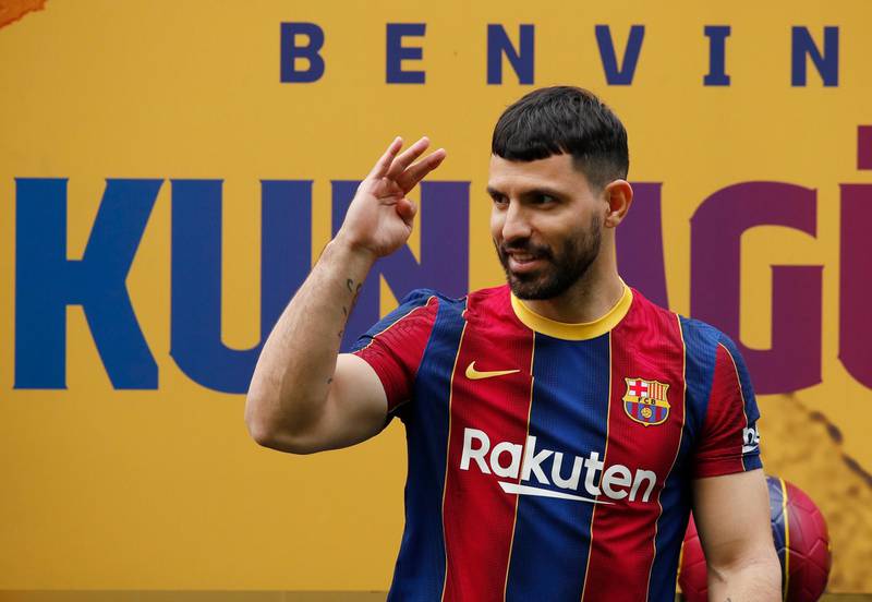 Barcelona's new signing Sergio Aguero poses during his presentation. Reuters