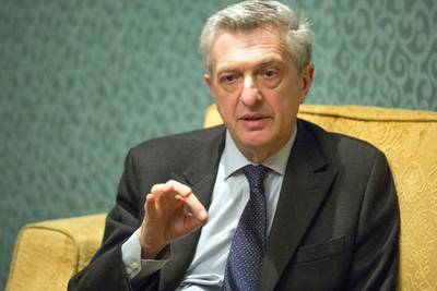 In this photo provided by UNHCR, United Nations High Commissioner for Refugees Filippo Grandi speaks during an interview in Cairo, Monday, Jan. 14, 2019. Wealthy countries should do more to help developing nations fund local refugee management, the head of the U.N. refugee agency urged Monday, saying that he himself would do "anything" to escape if he was stuck in a squalid camp such as those in war-torn Libya. Speaking to reporters after meeting with the Egyptian president, Grandi said that countries like Egypt do not receive enough recognition for hosting refugees. (Pedro Costa Gomes/UNHCR via AP)