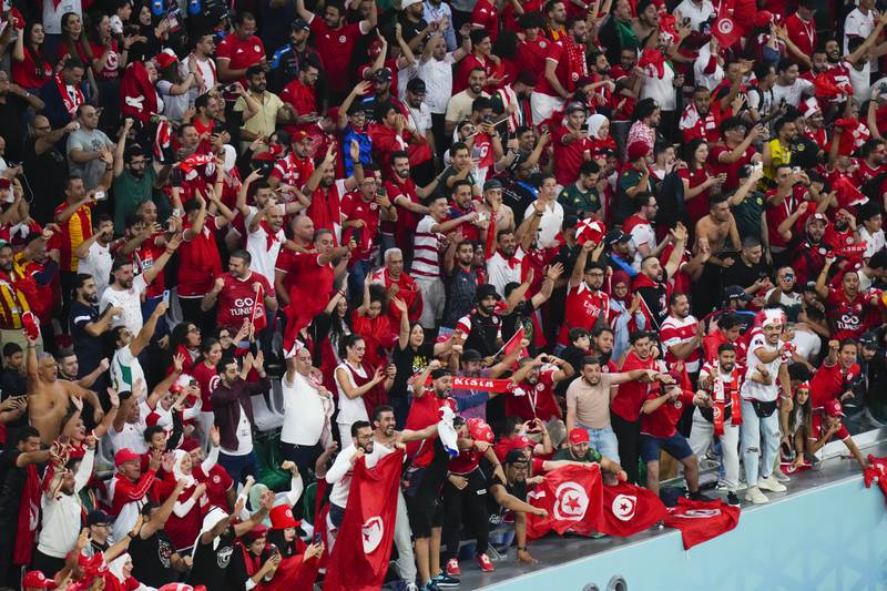 Fans of Tunisia cheer for their team during the World Cup group D soccer match between Tunisia and France at the Education City Stadium in Al Rayyan, Qatar. AP Photo