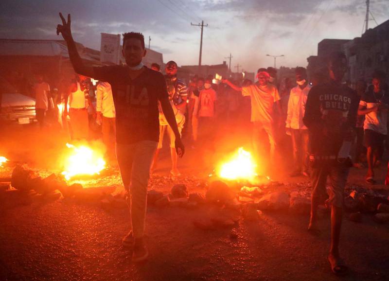 Sudanese protesters burn tyres as they march in protest for the deaths of other protesters earlier the same day in another state of Sudan, Khartoum, Sudan. EPA