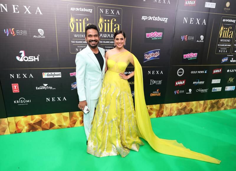 Genelia Deshmukh with a guest. Genelia's husband Riteish Deshmukh is one of the hosts of the IIFA Awards 2022. 