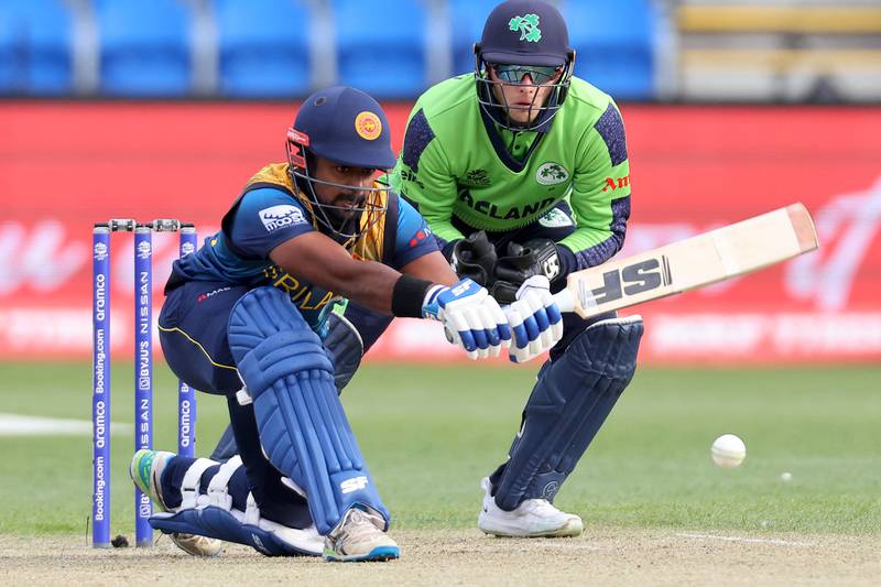 Charith Asalanka plays a shot watched by Ireland wicketkeeper Lorcan Tucker. AFP
