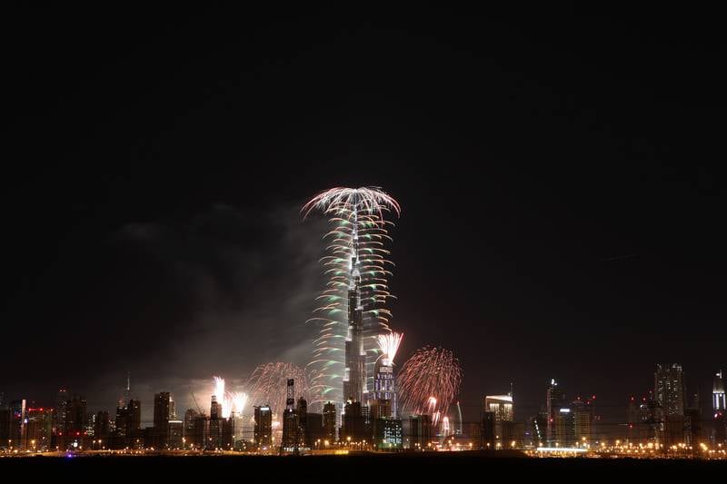 DUBAI , UNITED ARAB EMIRATES Ð Dec 31 , 2013 : Fireworks display on Burj Khalifa for the new year celebration at Downtown Dubai in Dubai. ( Pawan Singh / The National ) For News
