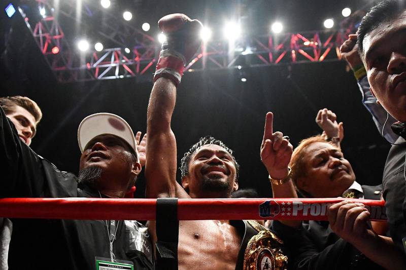 Manny Pacquiao celebrates his victory. AFP