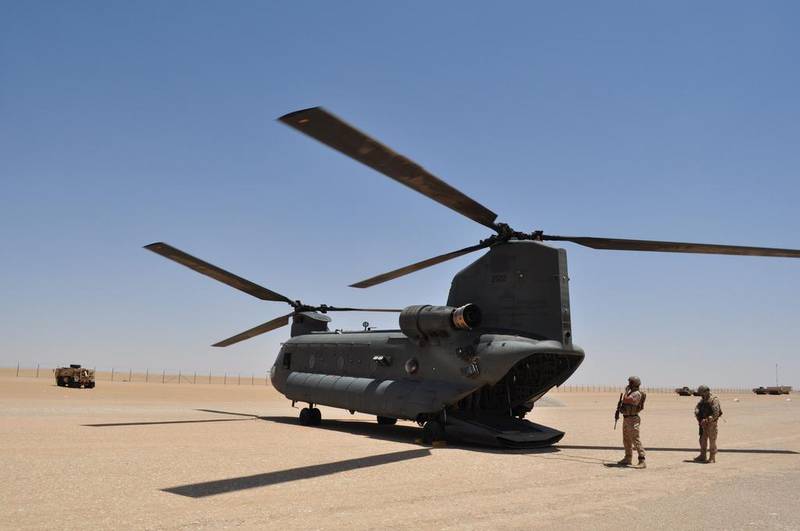 An Emirati Chinook military helicopter lands at the military base near Saffer. Adam Schreck / AP