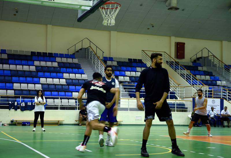 Reyadh oversees a training session of the men's team.