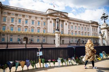 Floral tributes outside London's Buckingham Palace to the UK's Prince Philip, who died aged 99. Getty.