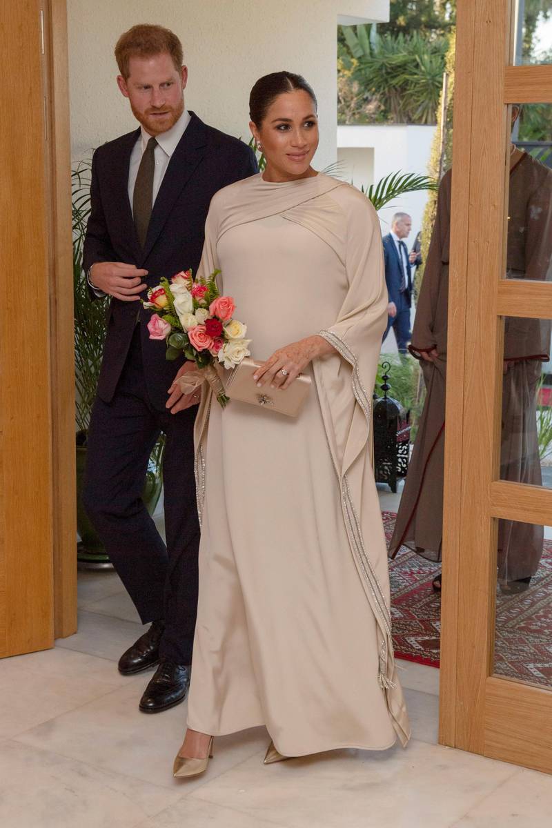 Meghan, Duchess of Sussex, in Dior, and Prince Harry at a reception hosted by the British Ambassador to Morocco at the British Residence in Rabat, Morocco, on February 24, 2019. EPA