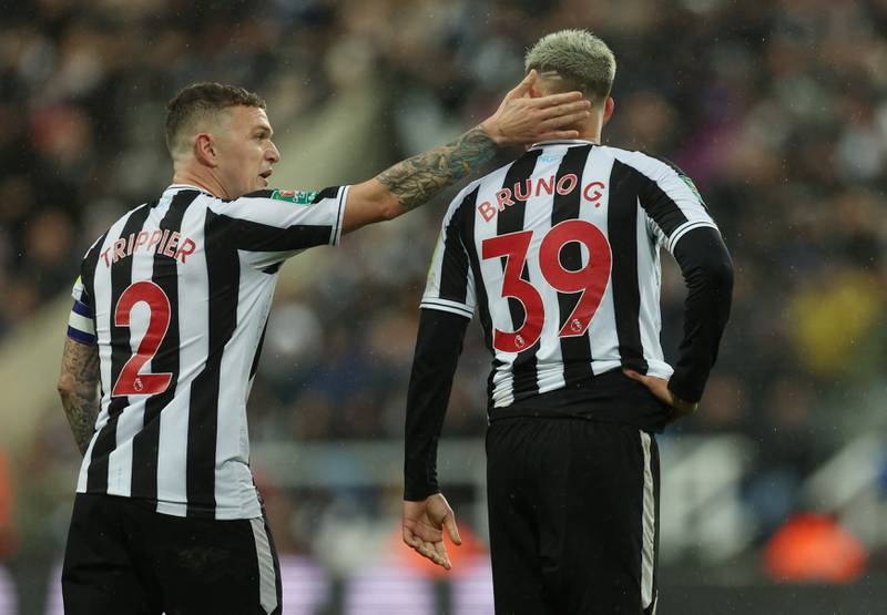 Newcastle's Bruno Guimaraes with Kieran Trippier after being sent off. Action Images