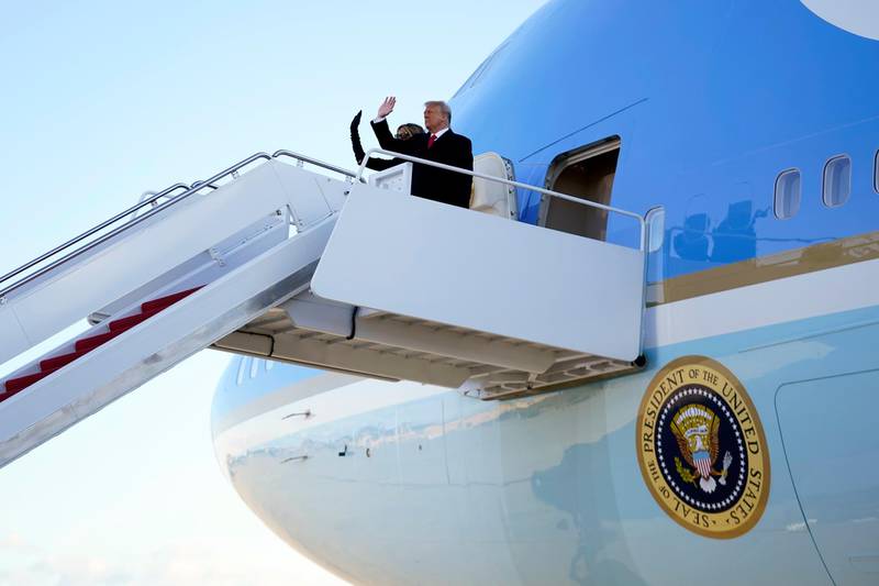 US President Donald Trump and first lady Melania Trump board Air Force One at Andrews Air Force Base, Maryland. AP Photo