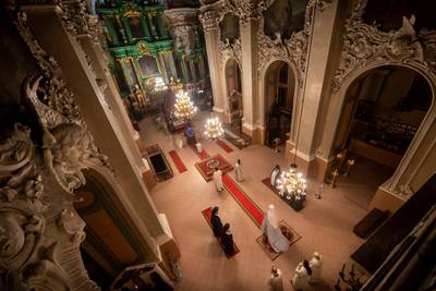 Lithuanian Orthodox priests attend in the Orthodox Christmas celebration Mass in the empty Orthodox Church of the Holy Spirit in Vilnius, Lithuania. AP Photo