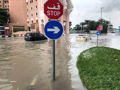 Dubai, United Arab Emirates, January 11, 2020. Water is logged outside the Movenpick Ibn Batutta Gate Hotel from heavy overnight rain. Several cars, including an RTA taxi, were waiting for pick-up trucks after breaking down in the water. James O'Hara / The National
