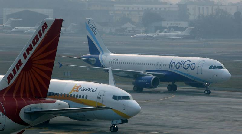FILE PHOTO: An IndiGo Airlines Airbust A320 aircraft and JetKonnect  Boeing 737 aircraft taxi past an Air India Airbus A321 aircraft at Mumbai's Chhatrapathi Shivaji International Airport February 3, 2013. REUTERS/Vivek Prakash/File Photo