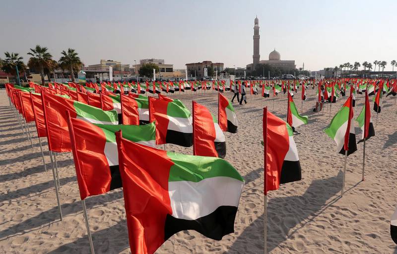 DUBAI, UNITED ARAB EMIRATES , Dec 1 – 2019 :- Decoration of UAE Flags at the Flag Garden near the Kite beach in Dubai. ( Pawan Singh / The National )  For News/Big Picture/Instagram