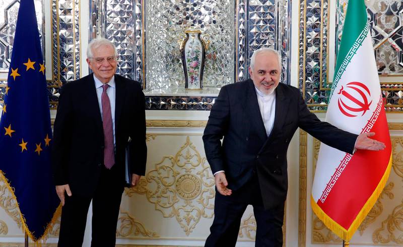 epa08190175 Iranian Foreign Minister Mohammad Javad Zarif (L) greets EU High Representative of the European Union Josep Borrell at the foreign ministry in Tehran, Iran, 03 February 2020. Borrell is in Tehran to meet with Iranian officials.  EPA/ABEDIN TAHERKENAREH