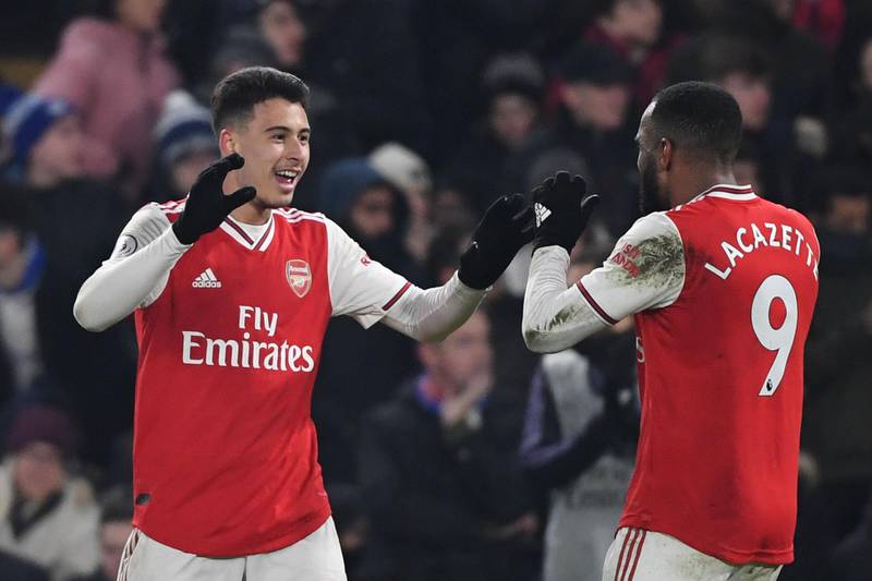 Arsenal's Brazilian striker Gabriel Martinelli (L) celebrates scoring their first goal to equalise 1-1 with Arsenal's French striker Alexandre Lacazette (R) during the English Premier League football match between Chelsea and Arsenal at Stamford Bridge in London on January 21, 2020. RESTRICTED TO EDITORIAL USE. No use with unauthorized audio, video, data, fixture lists, club/league logos or 'live' services. Online in-match use limited to 120 images. An additional 40 images may be used in extra time. No video emulation. Social media in-match use limited to 120 images. An additional 40 images may be used in extra time. No use in betting publications, games or single club/league/player publications.
 / AFP / DANIEL LEAL-OLIVAS / RESTRICTED TO EDITORIAL USE. No use with unauthorized audio, video, data, fixture lists, club/league logos or 'live' services. Online in-match use limited to 120 images. An additional 40 images may be used in extra time. No video emulation. Social media in-match use limited to 120 images. An additional 40 images may be used in extra time. No use in betting publications, games or single club/league/player publications.
