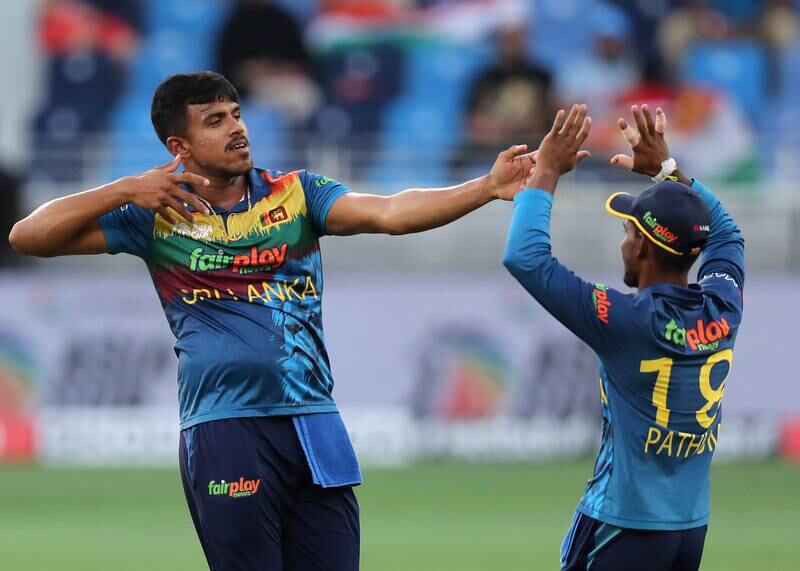 Sri Lanka's Maheesh Theekshana celebrates taking the wicket of India's KL Rahul. Chris Whiteoak / The National