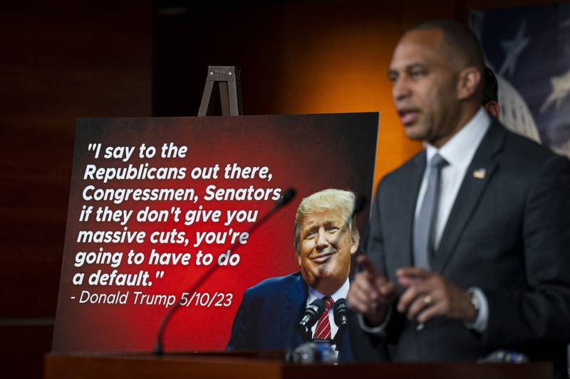 Mr Trump's debt quote became a political prop in Washington, displayed here by House minority leader Hakeem Jeffries. Bloomberg
