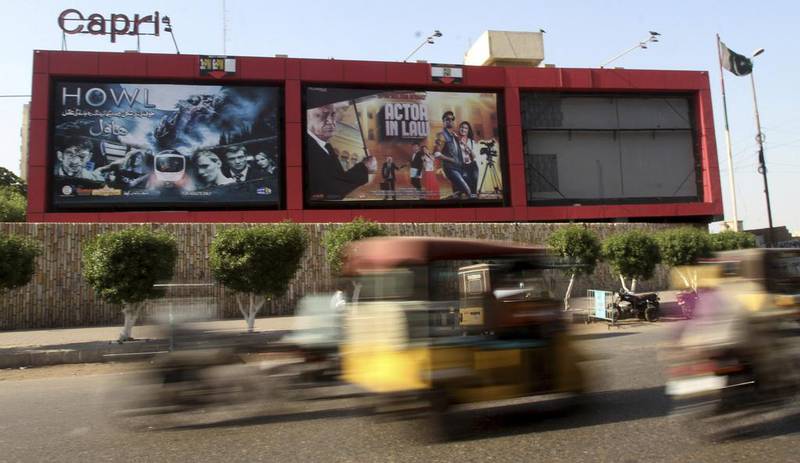 Billboards of a local cinema display films showing in Karachi, Pakistan, Saturday, October 1, 2016. Pakistani cinemas have stopped showing Indian films after India banned Pakistani actors because of  tensions over Kashmir. Fareed Khan / AP 
