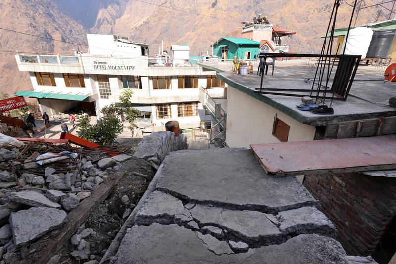Cracks in the ground near a hotel due for demolition in Joshimath. Reuters