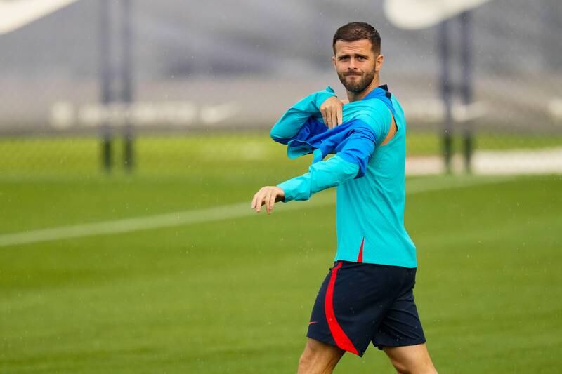 Barcelona midfielder Miralem Pjanic attends a training session on 2 September, 2022. The Bosnian is in UAE to mull over a transfer to Adnoc Pro League side Sharjah. EPA