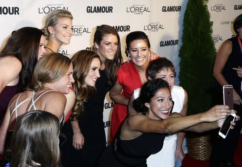 Members of the US Woman’s soccer team take a selfie during the 25th Annual Glamour Women of the Year Awards at Carnegie Hall in New York. Jason Szenes / EPA