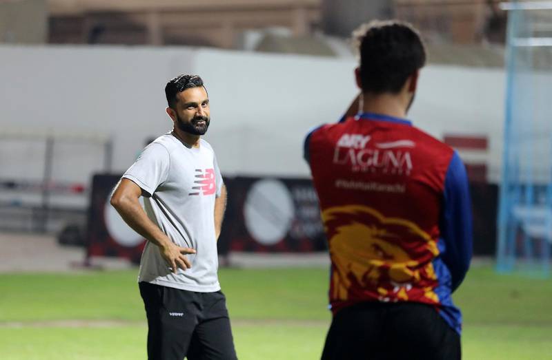 Left to Right- Coach Kashif Daud and Hassan Khan, the son of Afghanistan/IPL star Mohammed Nabi, during the training at Sharjah Cricket Academy in Sharjah on May 10,2021. Pawan Singh / The National. Story by Paul