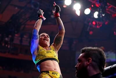 Jessica Andrade celebrates beating Mackenzie Dern at UFC 295. USA Today