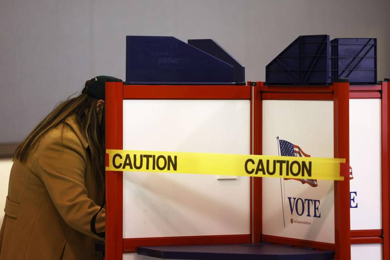 A person votes in a socially distanced space in Portland, Maine. AFP
