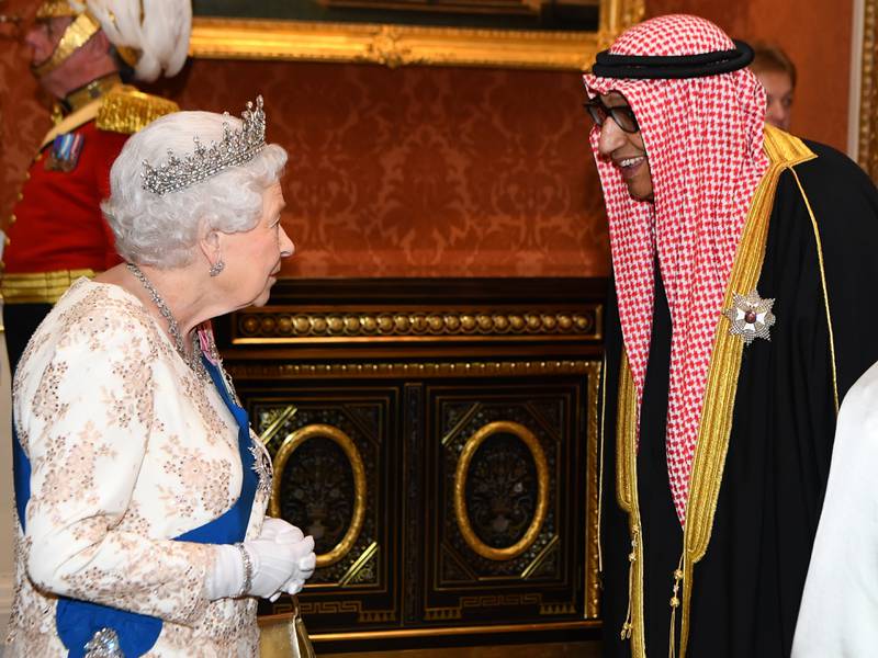 Queen Elizabeth II greets ambassador Khaled Al Duwaisan of Kuwait at a reception in London for members of the Diplomatic Corps at Buckingham Palace, in 2018. Getty Images