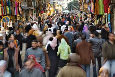A crowded street in Khan El Khalili Bazaar in Cairo, the Egyptian capital where about a fifth of its people live. Alamy