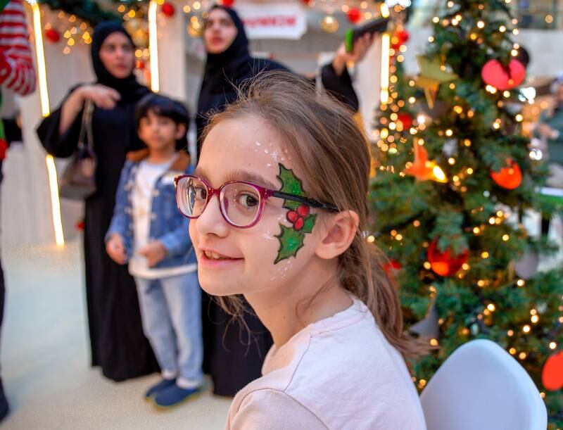 Emilia, 9, gets into the festive spirit at Town Square, Yas Mall. Victor Besa / The National