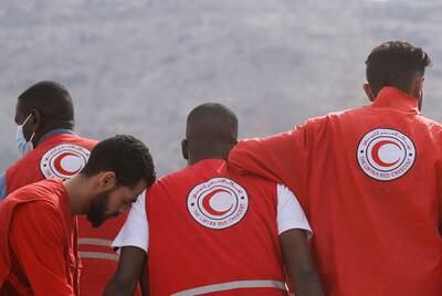 Libyan Red Crescent team members en route to Karsa. Reuters