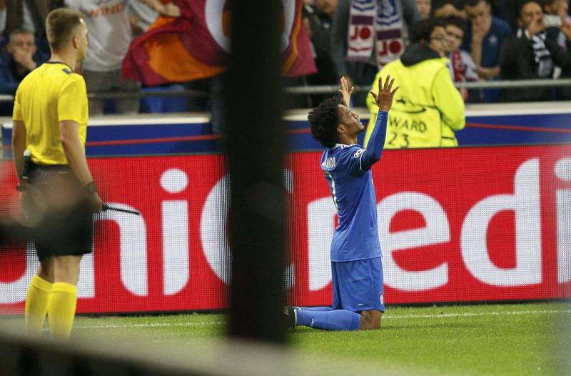 Juventus’ Juan Cuadrado celebrates after scoring against Lyon. Robert Pratta / Reuters