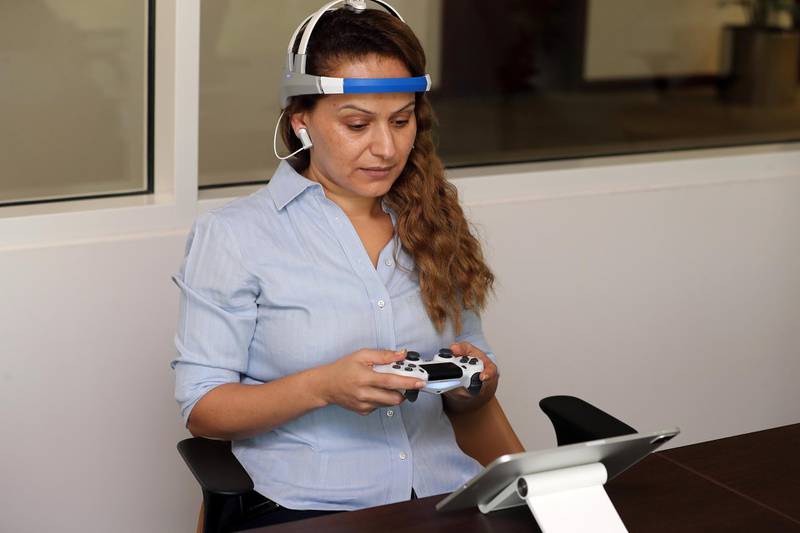 The Nationals Salam Al Amir tries the police's new brain fingerprinting device used to catch criminals at General Department of Forensic Science and Criminology in Dubai on April 21st, 2021. Chris Whiteoak / The National. 
Reporter: Salam Al Amir for News