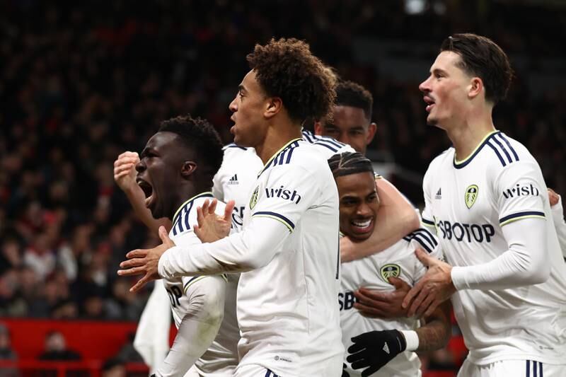 Leeds players celebrate after Raphael Varane of Manchester United scores an own goal to put the visitors 2-0 ahead. Getty