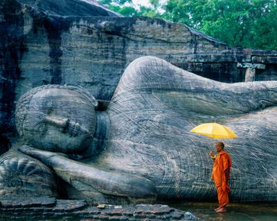 Buddhist Monk at the Gal Vihara. Polonnaruwa. Sri Lanka. Getty Images