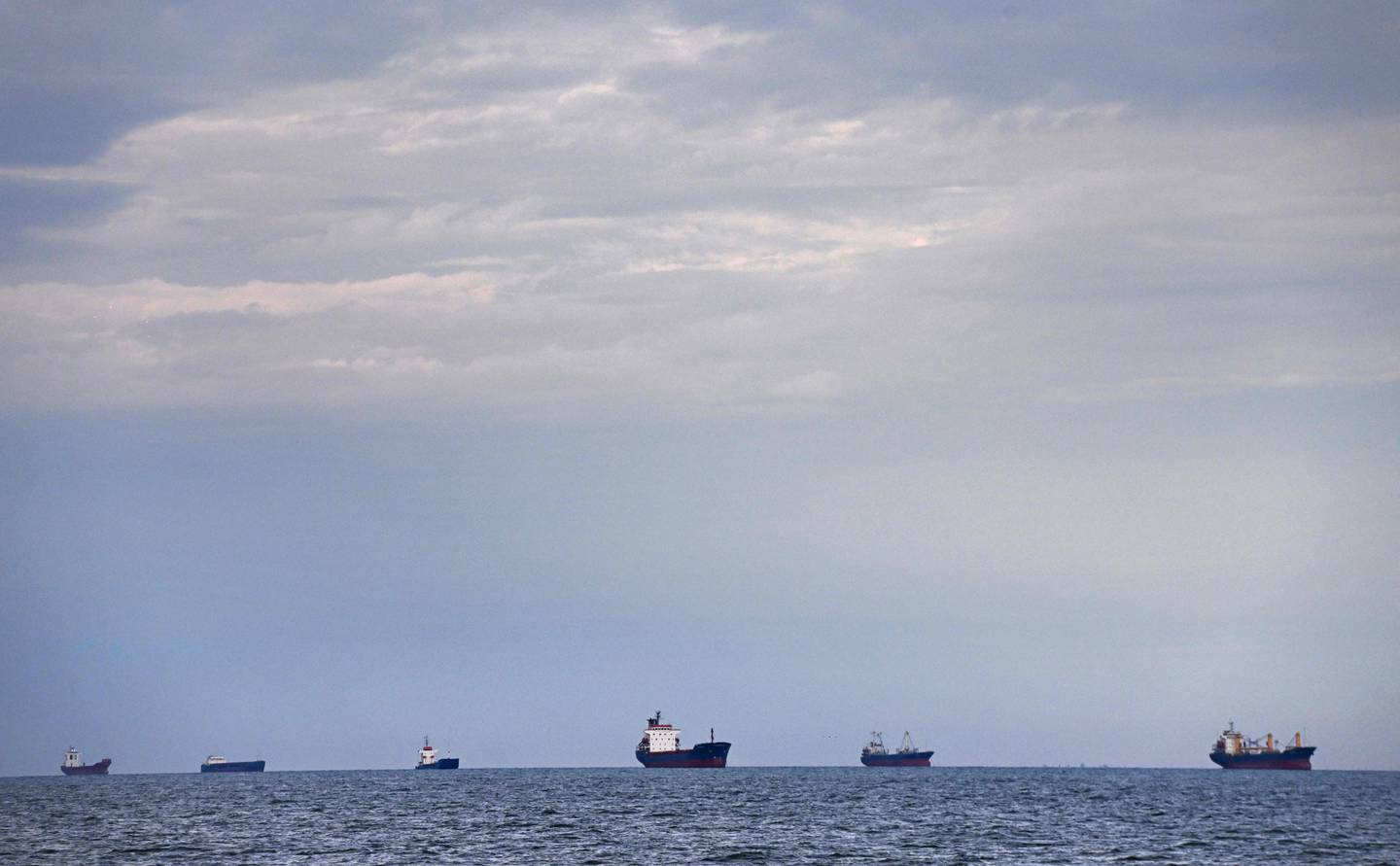 Ships anchored in the Black Sea wait to enter the Sulina canal, one of the spilling points of the river Danube into the Black Sea. AFP