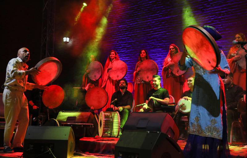 Iraqi Kurdish percussionist Hazhar Zahawy and Iranian musician Asal Malakzadeh play the daf.