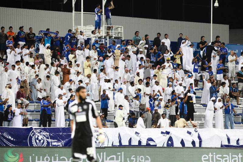 Dubai, UAE, December 5 2012: 

Al Nasr and FC Dibba battled it out tonight at the Maktoum Stadium. Unfortunately neither side had much to celebrate as the teams ended the match in a 1-1 draw.
Seen here are Al Nasr fans celebrating their team's goal.

Lee Hoagland/The National