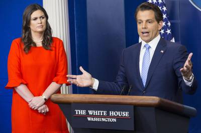 Anthony Scaramucci, director of communications for the White House, right, speaks as Sarah Huckabee Sanders, White House press secretary-designate, listens during a White House press briefing in Washington, D.C., U.S., on Friday, July 21, 2017. Wall Street veteran Scaramucci has been named President Trump's communications director after the abrupt resignation of ex-press secretary Sean Spicer. Photographer: Zach Gibson/Bloomberg