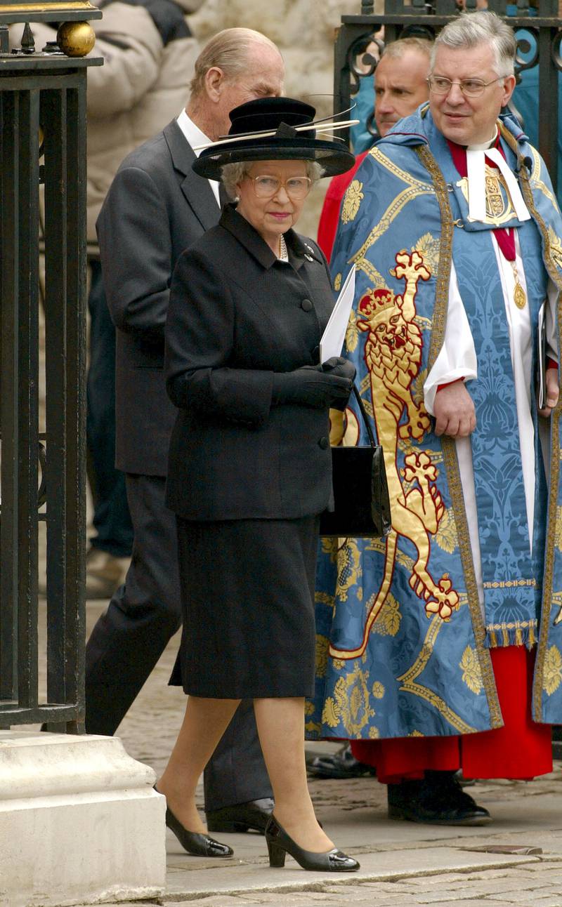 Queen Elizabeth II, wearing black mourning attire, leaves a memorial service for her sister, Princess Margaret, on April 19, 2002, at Westminster Abbey in London. Getty Images