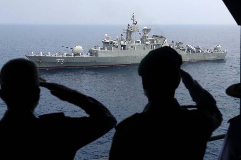 Iranian navy warships parade during the last day of military exercise in Gulf. EPA, HO Iranian military