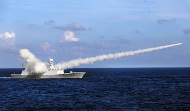 In this 2016 photo, Chinese missile frigate Yuncheng launches an anti-ship missile during a military exercise in the waters near China's Hainan Island and Paracel Islands. Tensions continue to rise between China and the US in this part of the world. AP Photo