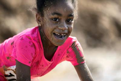 DUBAI, UNITED ARAB EMIRATES - DECEMBER 7, 2018. 

Children participate in the mini Tough Mudder challenge in Hamdan Sports Complex.

du Tough Mudder is a mud and obstacle course designed to test participant's physical strength, stamina, and mental grit. It is a team-oriented challenge with no winners, finisher medals, or clocks to race against. 

(Photo by Reem Mohammed/The National)

Reporter:
Section:  NA